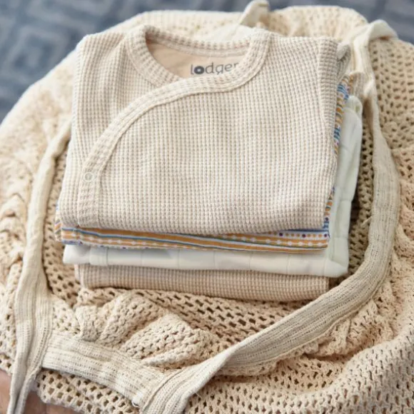 De Lodger Ciumbelle Overslagromper Cloud Dancer Mt. 62 is een praktisch rompertje voor pasgeboren baby's door de handige overslag. ✓Laagste Prijsgarantie